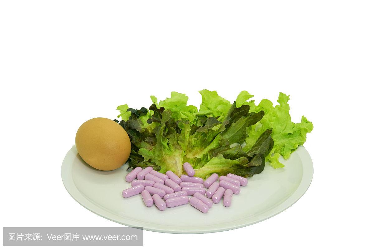 副本鸡蛋与胶囊,键盘上定制的紫色沙拉与白色游戏孤立背景图片