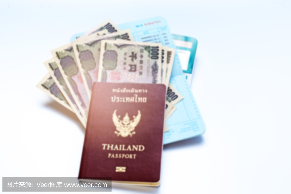 模糊的日本货币日元钞票与护照,储蓄财务和计