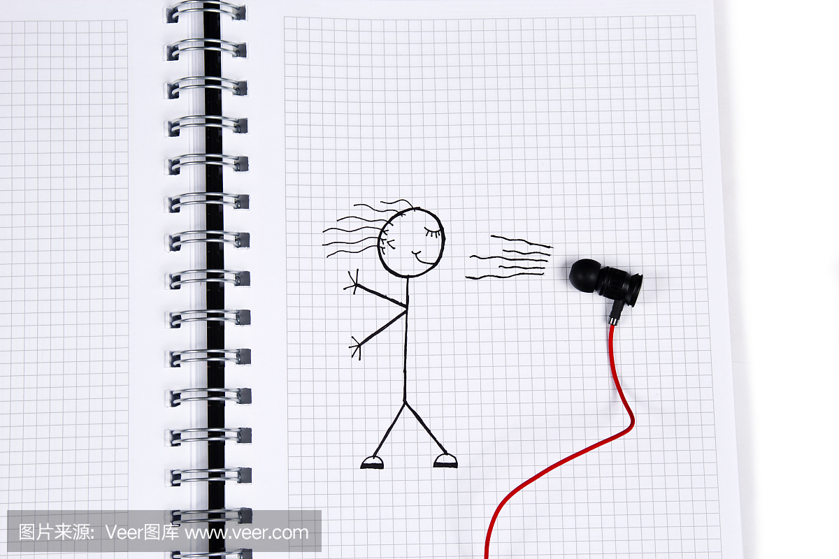 耳机和绘画女孩