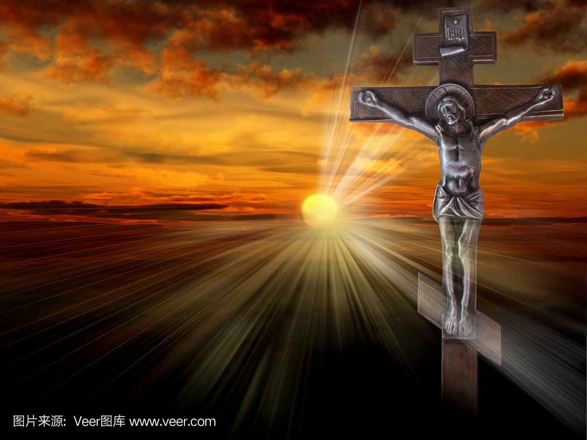 被钉十字架的耶稣基督在十字架上的剪影反对红