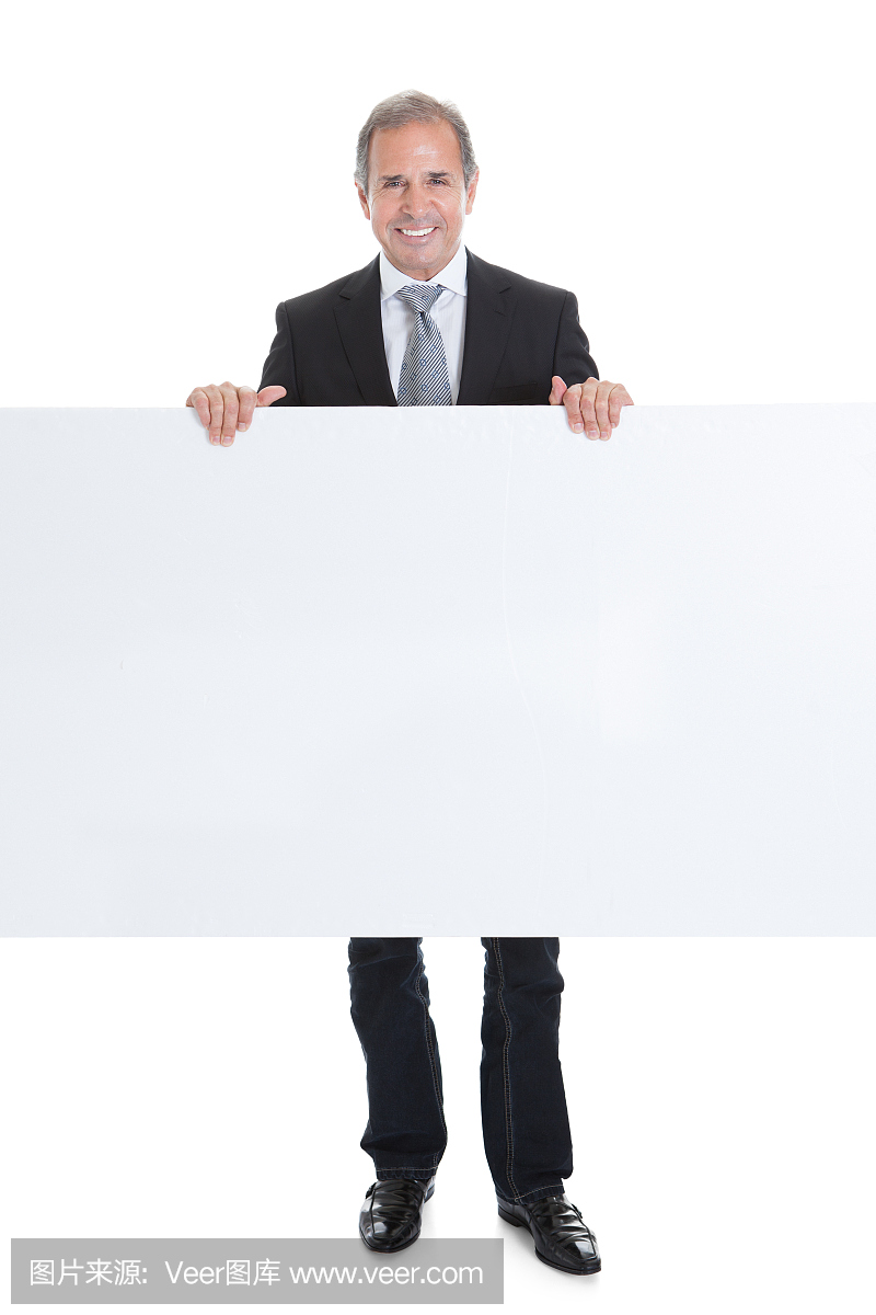 快乐的商人拿着空白标语牌