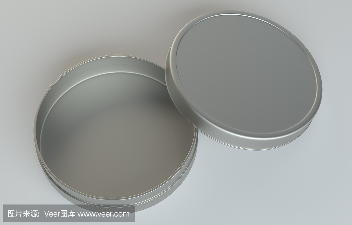 在灰色背景上的金属圆形盒子