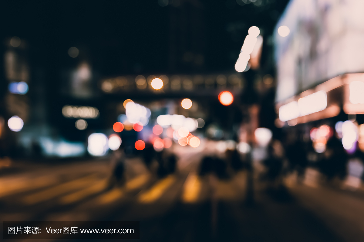 人走在夜街,香港的抽象模糊图像
