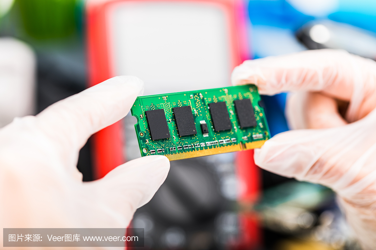 Laptop memory module in hands