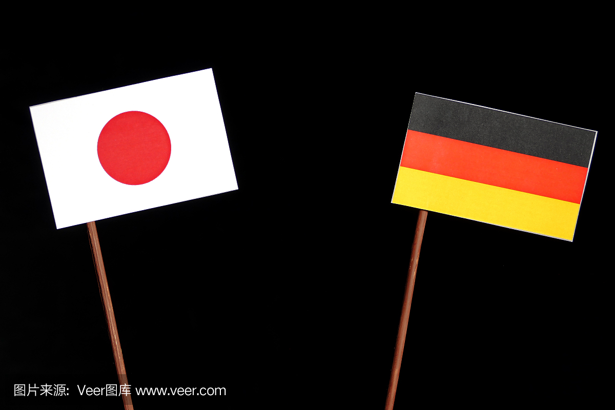 与黑色背景隔绝的德国国旗的日本国旗
