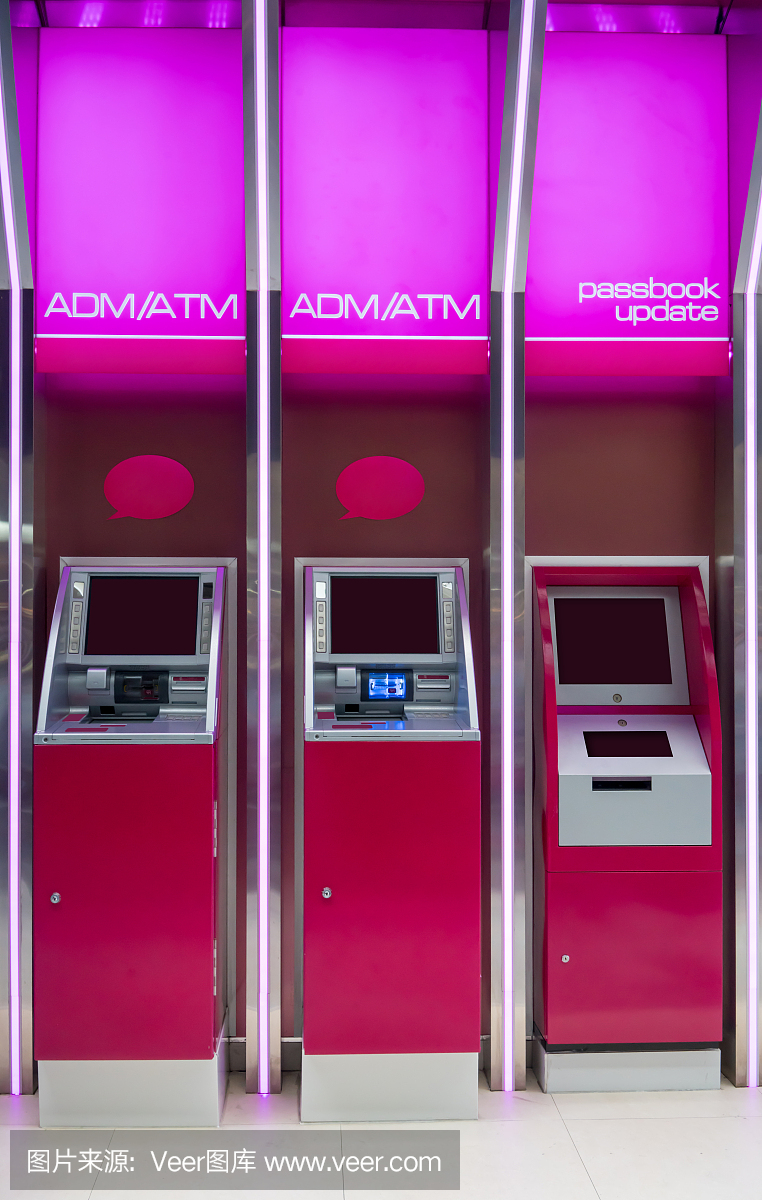 粉红色的ATM机和存折更新机。该站自动机器
