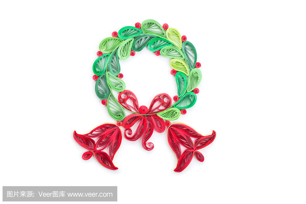 在白色背景上的创意纸花圈。 Quilling